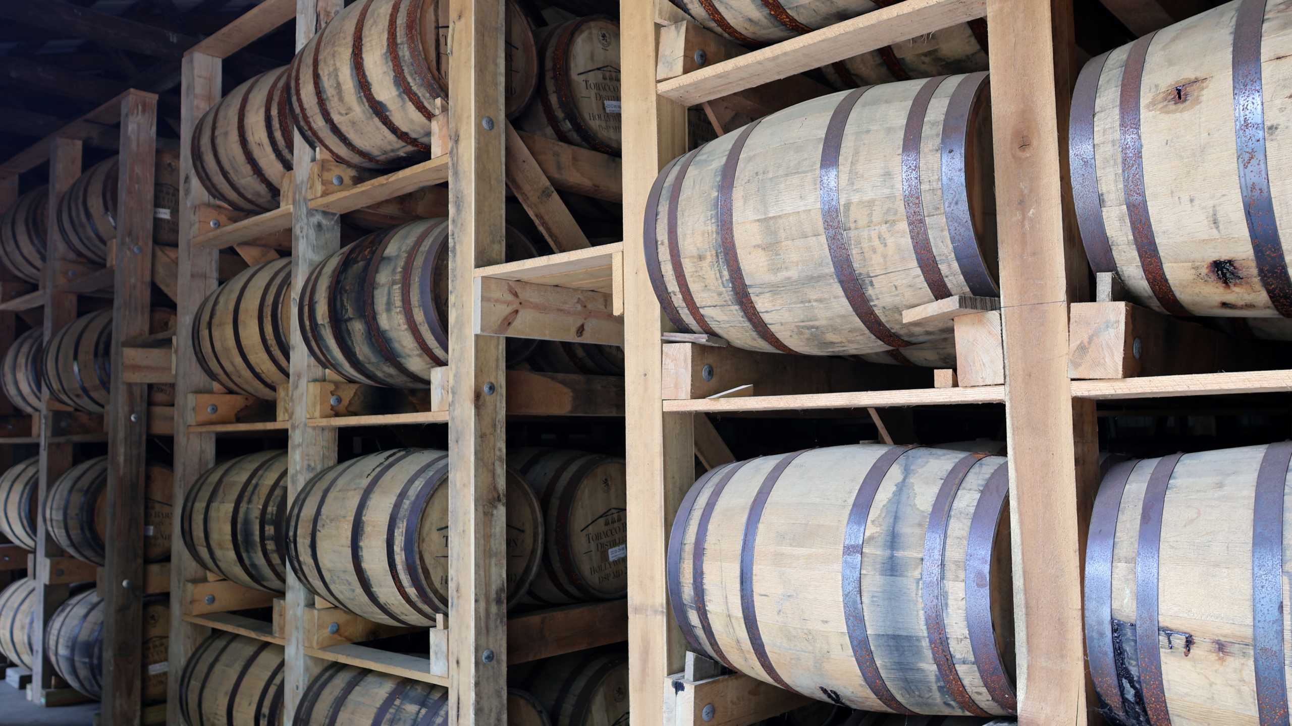 rye whiskey barrels in a rickhouse